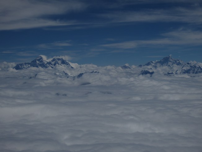Flying over the Himalayas on the way to Nepal, that's Mount Everest on the left!